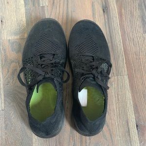 Womens black Nike free runs